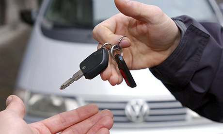 car and keys being handed over