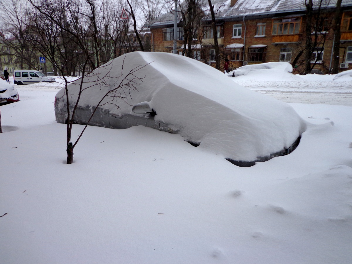 Car covered with snow